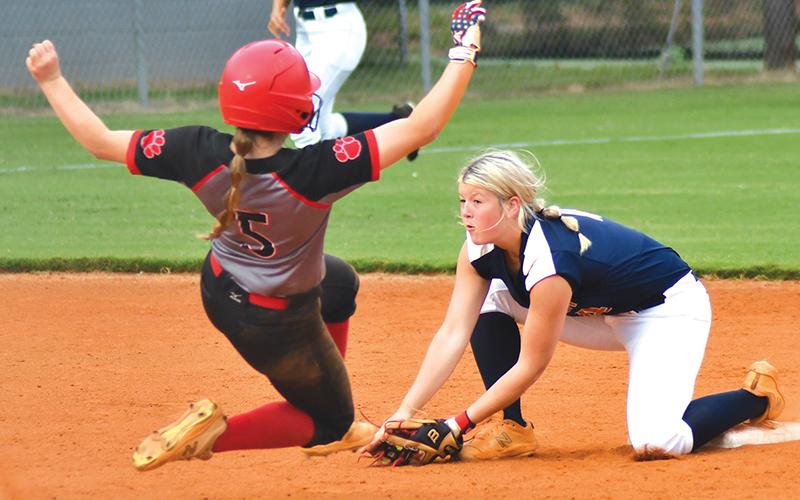 Rabun County’s Jacie McCall is tagged out at second base during a steal attempt on Aug. 24 by Habersham Central’s Jayden Thomas. LUKE MOREY/CNI News Service