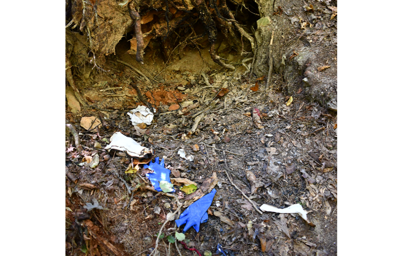 On Wednesday afternoon, there were burned pieces of the blue tarp Collier purchased at the Family Dollar in Clayton around 3 p.m. on Saturday, Sept. 10. There were also burnt red strands from the jersey she was wearing, along with burnt paper towels. ALAN NESMITH/Staff