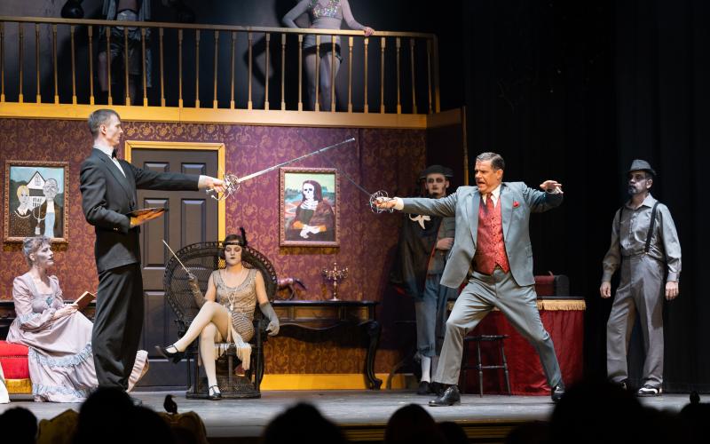 Lurch, played by Zachary Smagur (left), sword fights with Gomez (right), played by David Shalikashvili. ZACH TAYLOR/Special