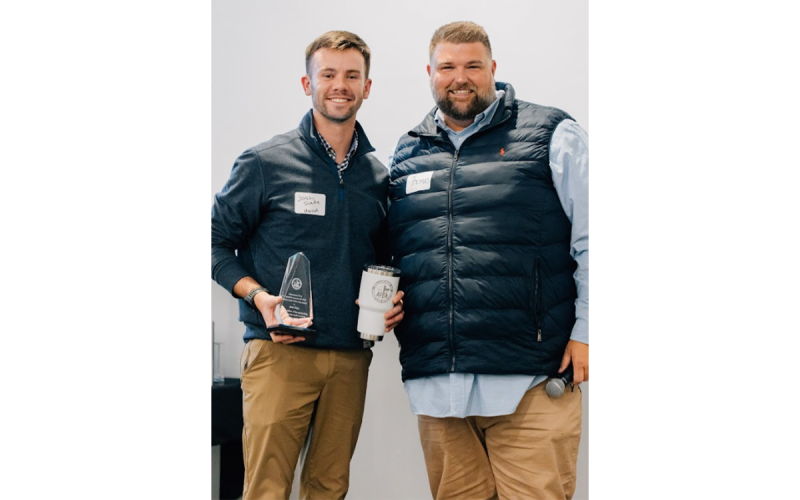 Habersham FCA Director Thomas Burnett handed out the hardware at the banquet, giving out awards to Male Coach of the Year Josh Slate. BAILEY WEISSER/Submitted