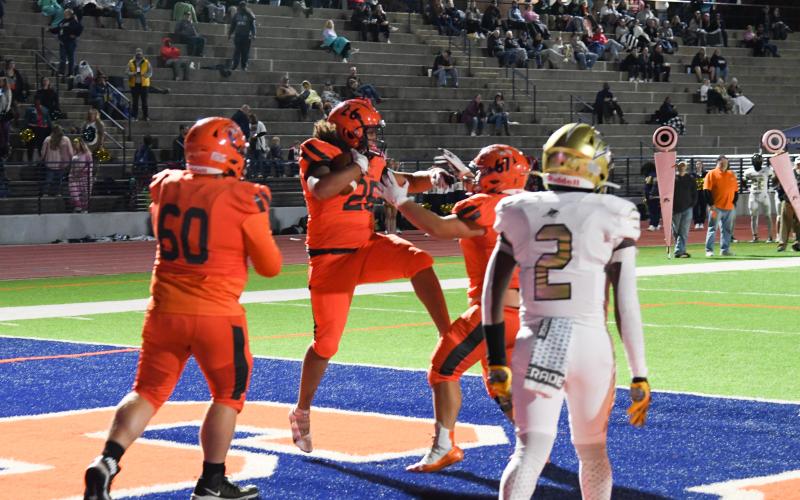 Habersham Central’s Eathan Martin celebrates a touchdown with teammates during Friday’s win over Apalachee. TOM ASKEW/Special