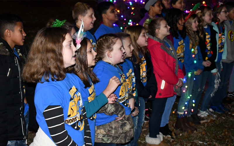 Baldwin Elementary’s choir sang at the city’s tree lighting Friday. MATTHEW OSBORNE/Staff