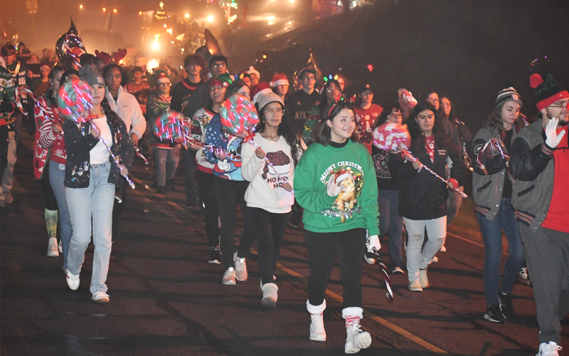 The Habersham Band of Blue played Christmas tunes while dressed festively. MATTHEW OSBORNE/Staff