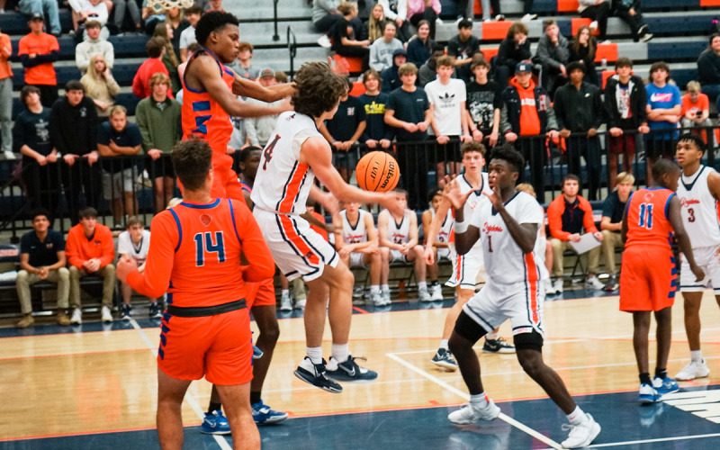 Habersham Central’s Brannon Gaines draws defenders in before making a nice dropoff pass to Bryce Pittman for two of his game-high 22 points. CODY ROGERS/Special