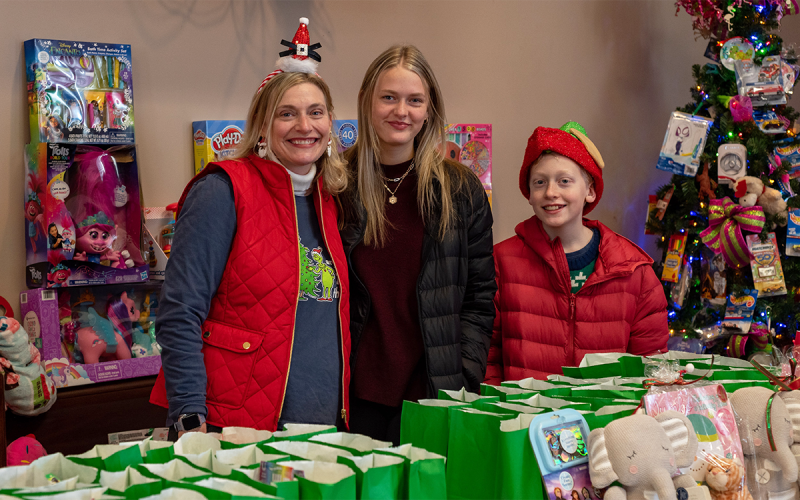 Kathryn, Claire and Caleb Kelly gave their time to help with the community event at First Presbyterian Church on Christmas. E. LANE GRESHAM/Special