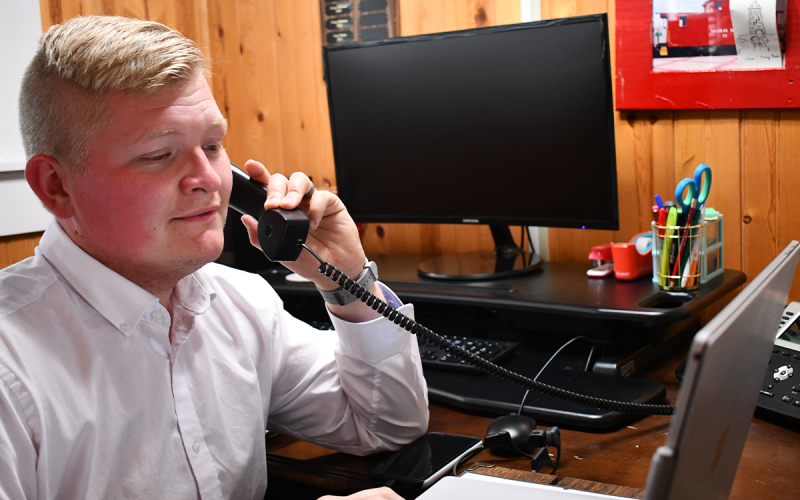 Noah Hamil, the new Main Street Manager for Cornelia, makes a connection as he gets started in his new position. JOHN DILLS/Staff