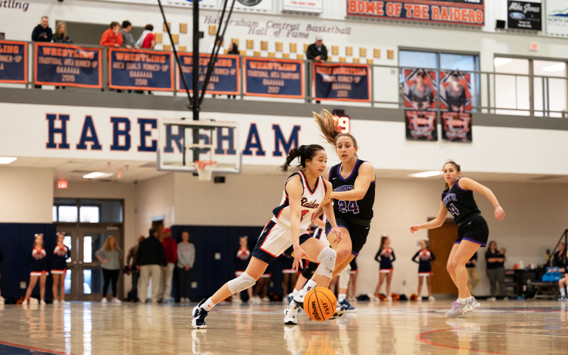 Lady Raiders Jazky Bantaum dribbles past a North Forsyth defender in Saturday night’s game. ZACH TAYLOR/Special