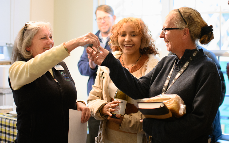 Habitat for Humanity Executive Director Nanette Baughman (left) hands the keys to new homeowner Lisa Thomas. ZACH TAYLOR/Special