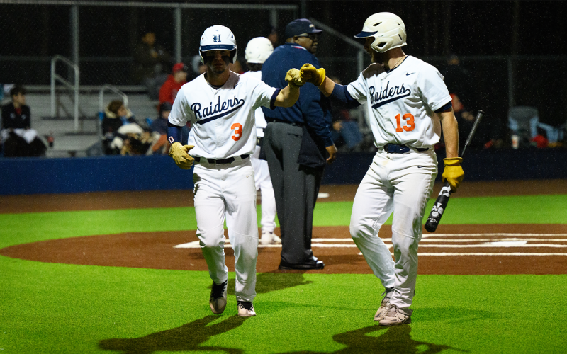 The rain could not stop the Raiders as Mason Dawe and Cooper Shirley fist bump after scoring against Stephens County. ZACH TAYLOR/Special