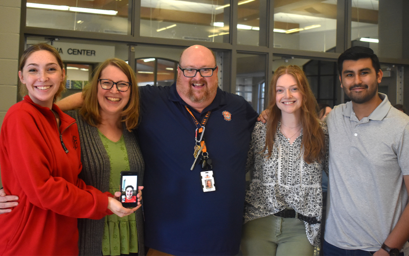Ryan Dukes’ family was there Wednesday to help the school honor him. From left are daughter Cecilia Dukes, wife Nora Dukes, Dukes, daughter Katherine Dukes and her fiance Milton Conde. EMMA MARTI/Staff