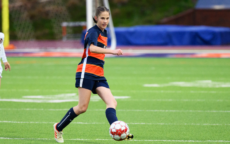 Eden Turner kicks the ball to her teammate in the first overtime period of the Lanier match. ZACH TAYLOR/Special