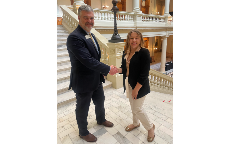 North Habersham Middle School student Marley Gallman shakes hands with Rep. Victor Anderson during her day as his page. DENNIS GALLMAN/Submitted