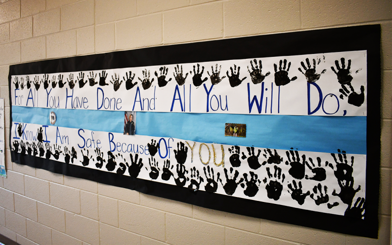The children have made banners to show their appreciation for Gonzalez’s kindness and service. JOHN DILLS/Staff