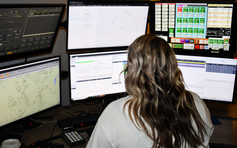 Dispatcher Nadia Newsom responds to an emergency call on Monday afternoon. JOHN DILLS/Staff