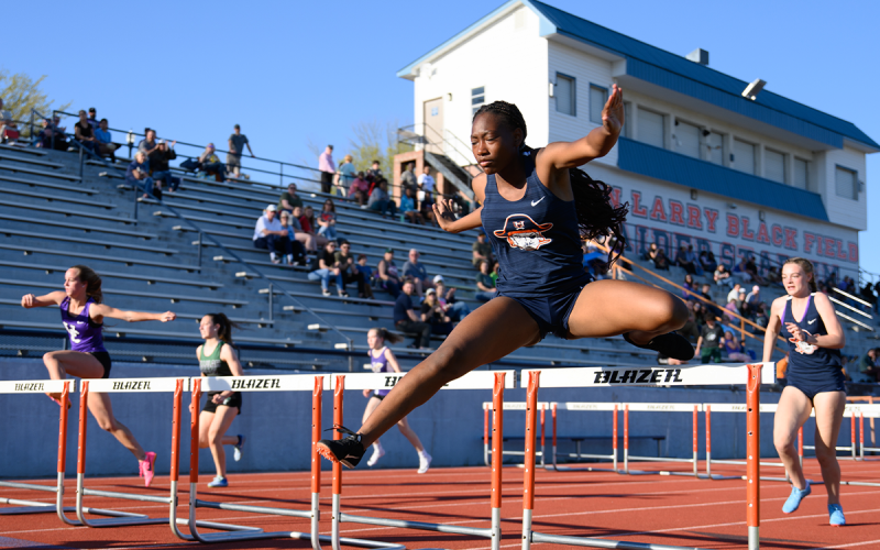 Habersham Central’s Julia Johnson (right) crosses the last row of hurdles in heat two of the Battle of the Blue Ridge track meet. ZACH TAYLOR/Special