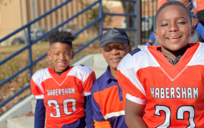 Bernard Trimiar (middle) is shown with his grandsons Brady and Brody during one of their Raider youth football games. Bernard has contributed as a coach, umpire and referee in addition to his Ring of Honor playing days of the 1970s. SUBMITTED