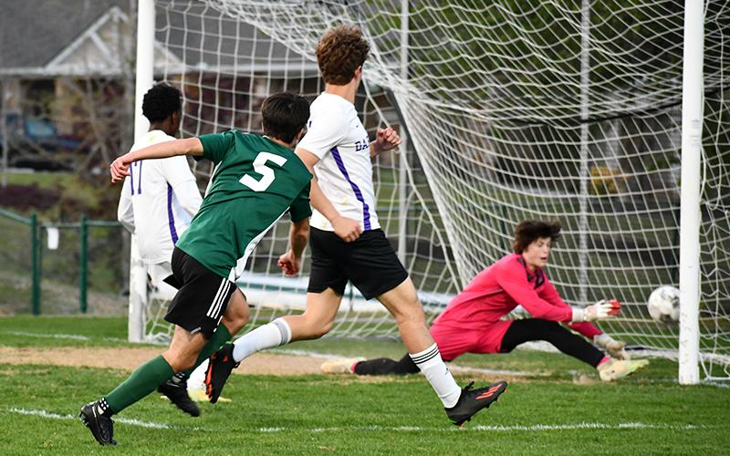 Tallulah Falls' Koen Eller watches his shot get past Darlington's goalkeeper during the first-round playoff win. MATTHEW OSBORNE/Staff