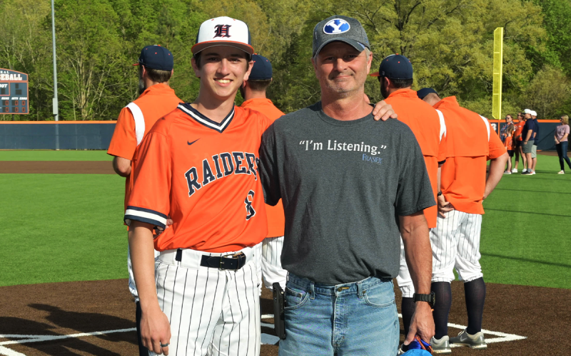 Dan  “Lieutenant Dan” Griswold escorted on Senior Day by his father Loren Griswold. RANDY CRUMP/Special