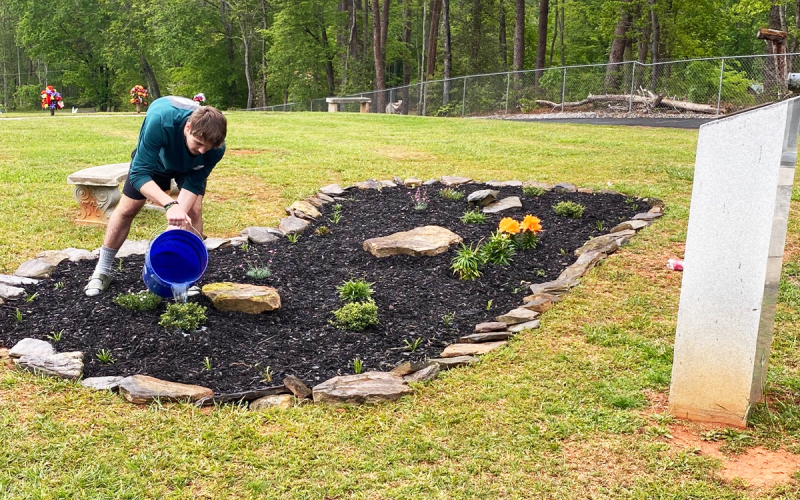 Christian Cooper worked his way through his Eagle Scout project on April 29. The project he chose was to make a flower bed at the VFW Memorial Park. SUBMITTED