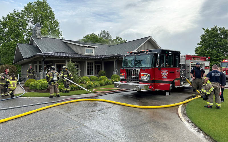 Habersham County Emergency Services personnel wrap up operations at Monday morning’s fire that damaged The Orchard Golf Club Clubhouse inside The Orchard. HABERSHAM COUNTY/Submitted