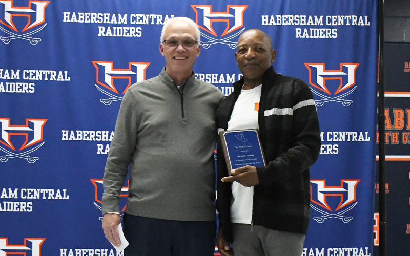 Bernard Trimiar (right) was presented by Coach Ken Ray. LANG STOREY/Staff