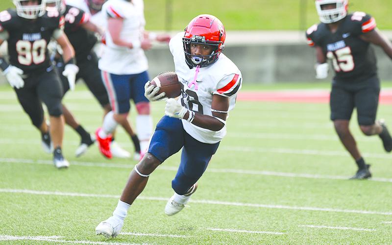 Antonio Cantrell breaks into the open field during the spring game in Hartwell. TOM ASKEW/Special