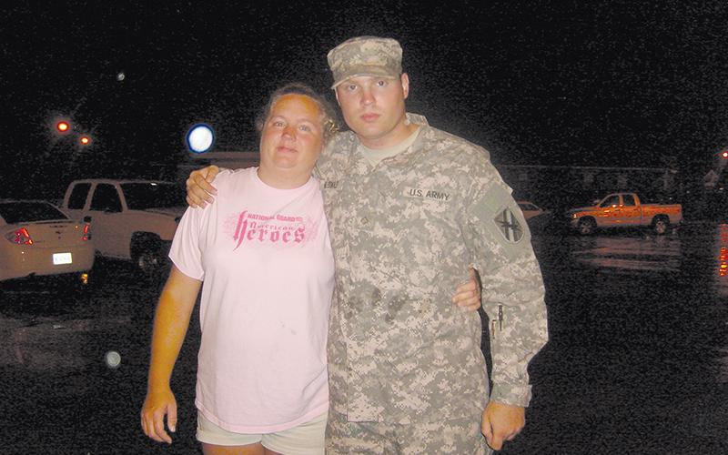 Pam Wheeler gets in a hug with her son Michael McDonald before his deployment to Afghanistan in 2010. McDonald returned home but later took his own life.