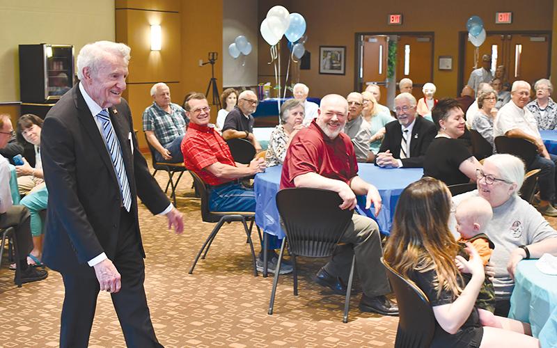 Larry Whitfield (left) can hardly believe so many folks showed up just to celebrate his birthday. The community icon turned 80 on  May 17.