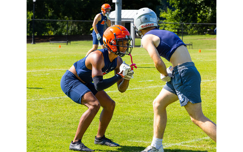 Somdee Satiphone gets right in the receiver’s grill just before a play. RILEY WILSON/Special