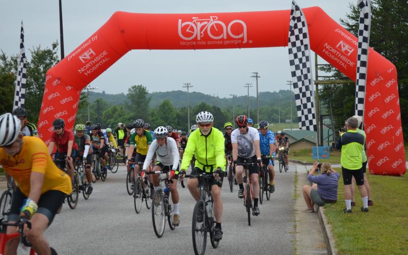 Riders with the Bike Ride Across Georgia (BRAG) spent Sunday night in Clarkesville before launching the next leg of their journey from the Ruby Fulbright Aquatic Center. MATTHEW OSBORNE and ZACH TAYLOR/Staff