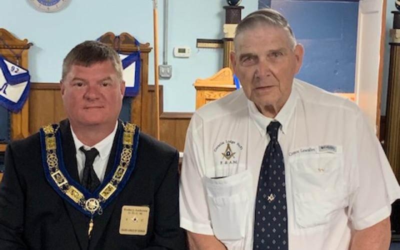 Pictured right is Brother Clarence Lewallen.