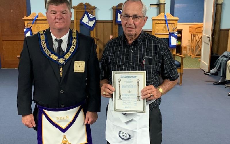 Pictured right is Brother Ross Martin.