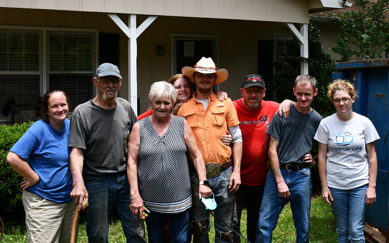 Family members help George and Pam (second and third from left) Anderson pack up their items in anticipation of the eviction coming the couple’s way. Left to right are Rachel Witcher, Tiffany Witcher, Austin Shedd, Robert Witcher, Nicholas Witcher and Whitney Witcher. JOHN DILLS/Staff