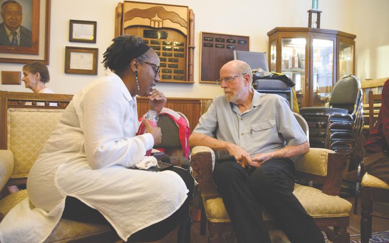 Audrey Davenport (left) speaks with Jim Johnston (right) during the “Think and Listen” seminar at Sautee Nacoochee Cultural Center in honor of Juneteenth. The “Think and Listen” session allowed patrons to voice their opinions and discuss matters about race, religion, and other topics with an engaged partner. ZACH TAYLOR/Special