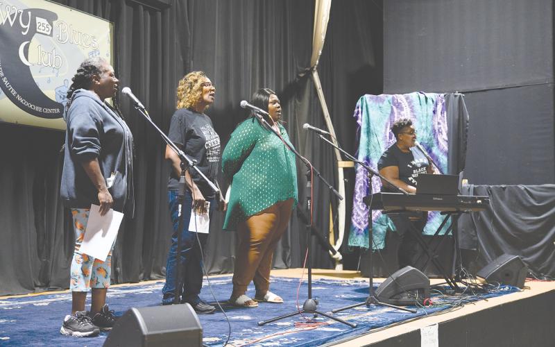 Sautee Nacoochee Cultural Center’s Juneteenth celebration continued with a performance by the Bean Creek Missionary Baptist Church Choir and Shady Grove Baptist Church’s Portia Burns. The Bean Creek Choir was made up of Sabrina Moss (left), Cassandra ‘Tink’ Hamilton (center), and Renea Hamilton (right). ZACH TAYLOR/Special