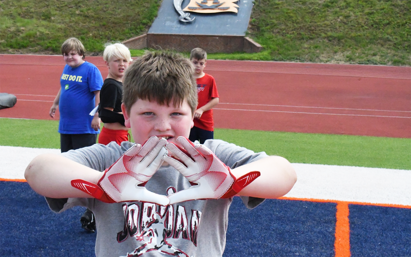 Kipton Rider says these gloves are made for catching. LANG STOREY/Staff