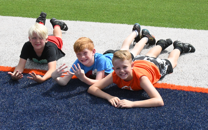 Trey Smith, Wesley Hicks and Chandler Dale take a short break from the fun Thursday. LANG STOREY/Staff