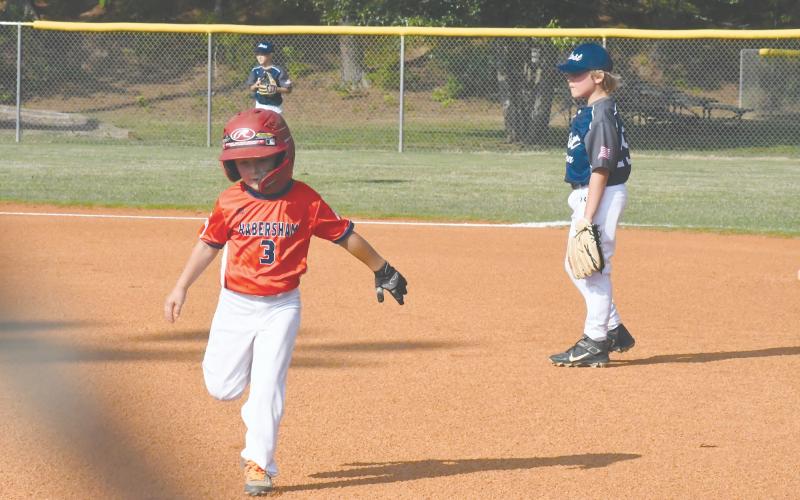 Habersham's Tobias Chastain runs back to first during the 8-U recreation tournament.