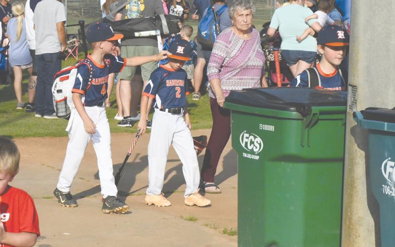 Finnley Gibson and Elijah House share a moment in between games.