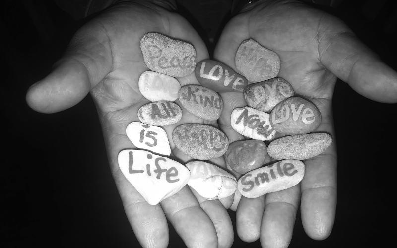 Troyce Simmons shows off some of his treasures used for Pebble Ministries. FILE