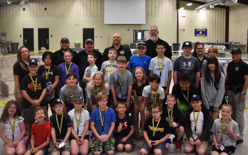 SROs, Habersham County Sheriff Joey Terrell and Crime Scene Technician Kayla Neal joined 30 students gathered in the AG Barn on the campus of Habersham Central High School to learn the ins and outs of solving a crime. EMMA MARTI/Staff