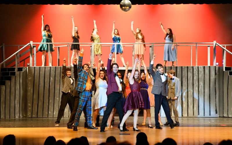 In the rehersal for Habersham Community Theater’s production of “Footloose,” the cast celebrates after the ban on dancing gets lifted and the teenagers of the town of Bomont host a dance where everyone gets Footloose. The show runs at Habersham Central High School today through Sunday. ZACH TAYLOR/Special