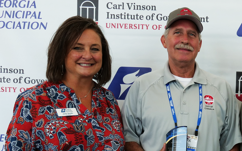 Cornelia Commissioner Mark Reed receives his award from Julie Smith, Mayor of Tifton and Immediate Past President of the Georgia Municipal Association. MARK REED/Submitted