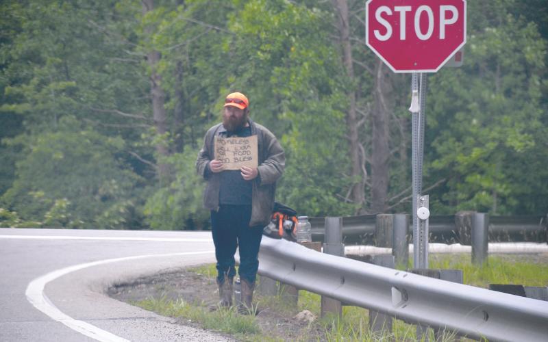 Panhandlers have drifted out of Cornelia to the outskirts of town in the county’s jurisdiction. MATTHEW OSBORNE/Staff