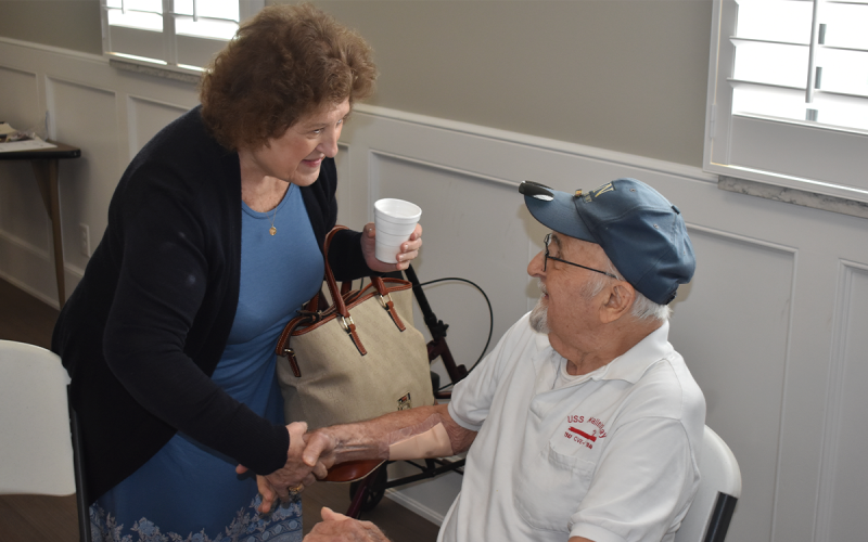 Aloma Santarsiero talks with Hank Sawicki after his remarks at the Veterans &amp; Patriots breakfast on Saturday. MATTHEW OSBORNE/Staff