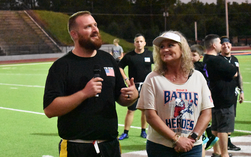 Easton Foundation President Casey Lizama and vice president Sonya Hix address the crowd at halftime. MATTHEW OSBORNE/Staff