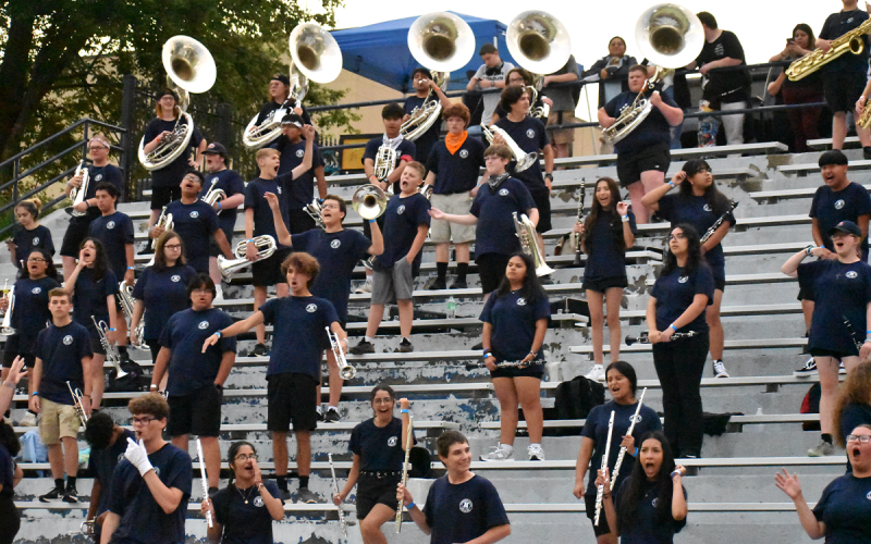 Band of Blue members enjoyed being the musical backdrop for the Heroes. MATTHEW OSBORNE/Staff