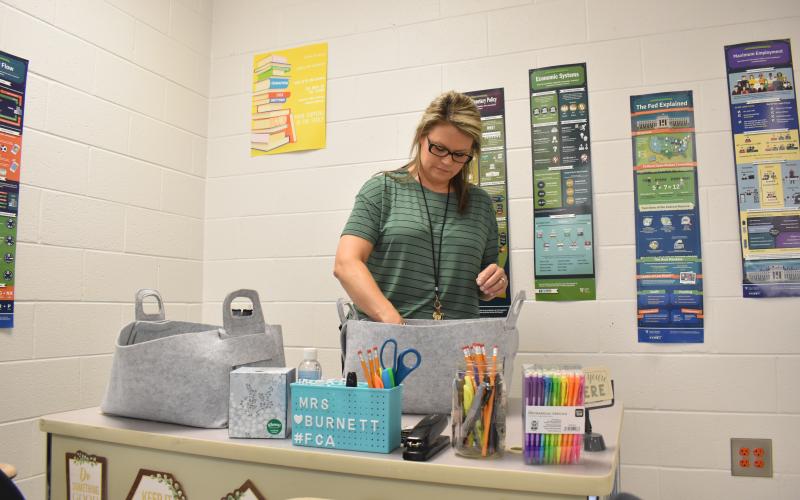 Habersham Central teacher Samantha  Burnett gets her supplies ready for the  upcoming first day for students on Friday. MATTHEW OSBORNE/Staff