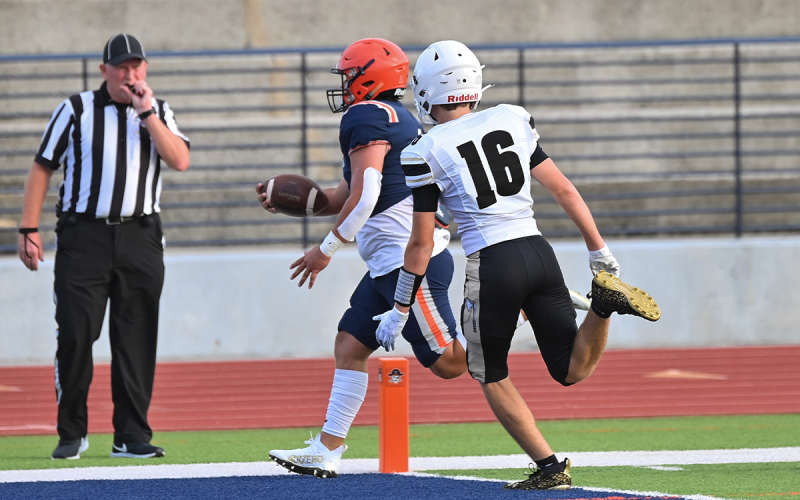 Hayes Gunn takes it in for a touchdown against East Hall. TOM ASKEW/Special