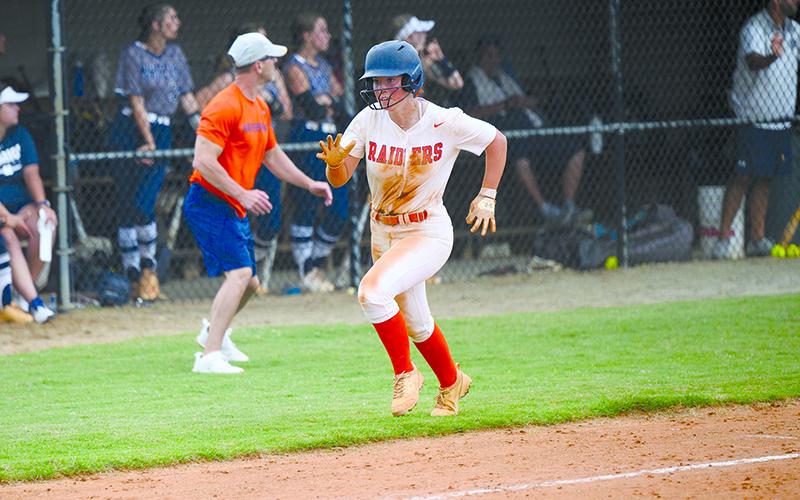 Emily Diffenderfer rounds third on her way to scoring the first run after an RBI base hit from Hannah Odum. ZACH TAYLOR/Special